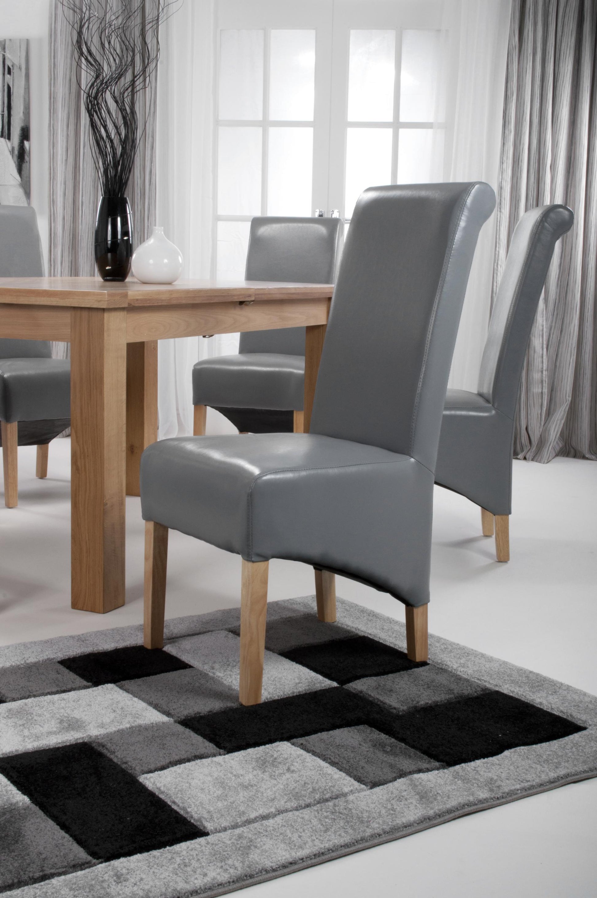 Krista Roll Back Bonded Leather Grey Dining Chair - Blythe Living