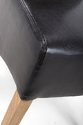 Krista Roll Back Bonded Leather Black Dining Chair - Blythe Living