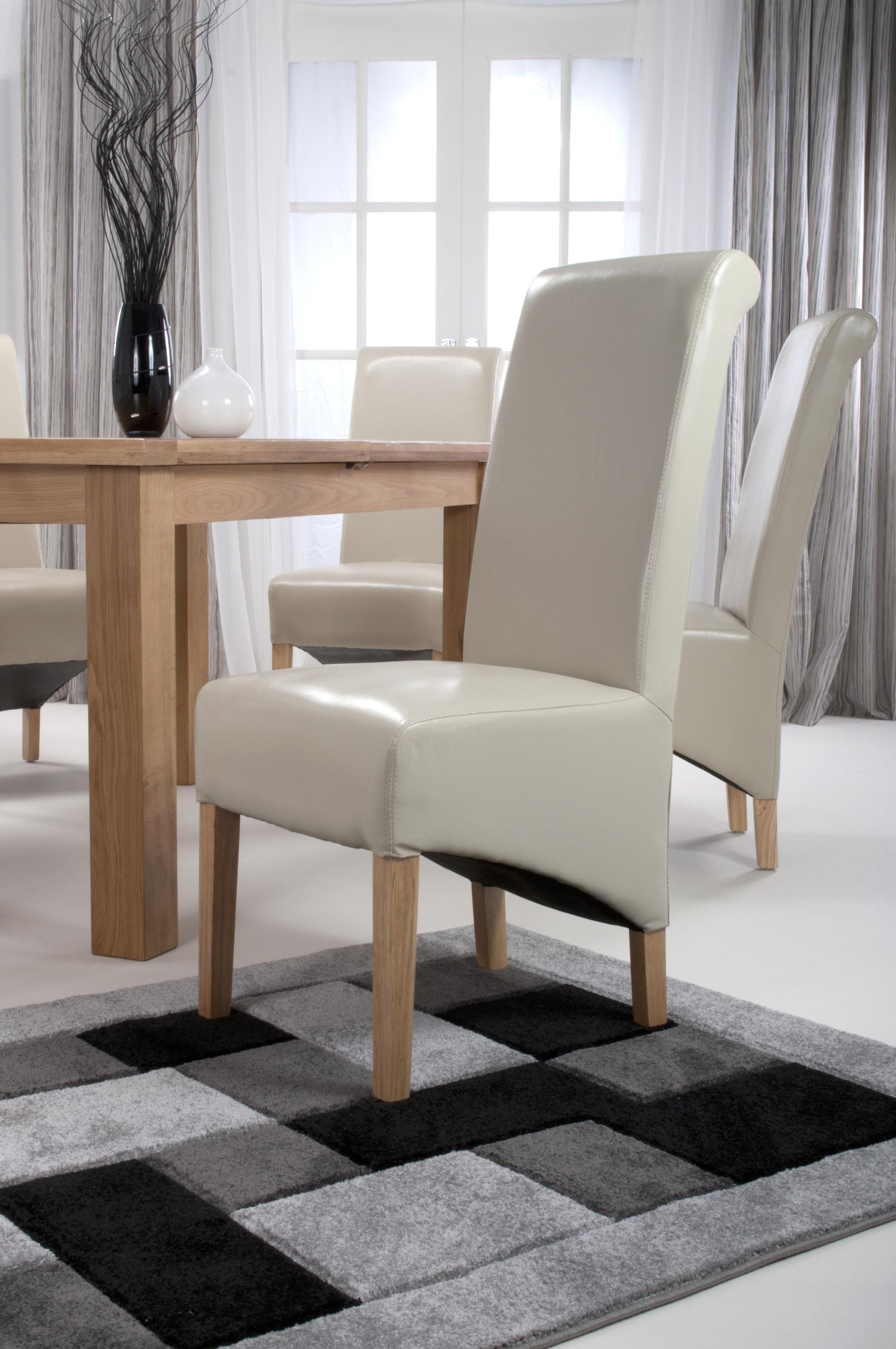 Krista Roll Back Bonded Leather Ivory Dining Chair - Blythe Living