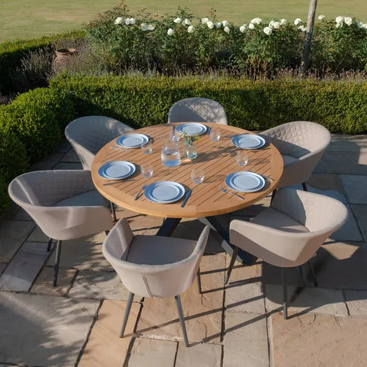 Maze - Jakarta Teak Round Dining Table
with 6 Outdoor Fabric Ambition Oatmeal Dining Chairs - Blythe Living