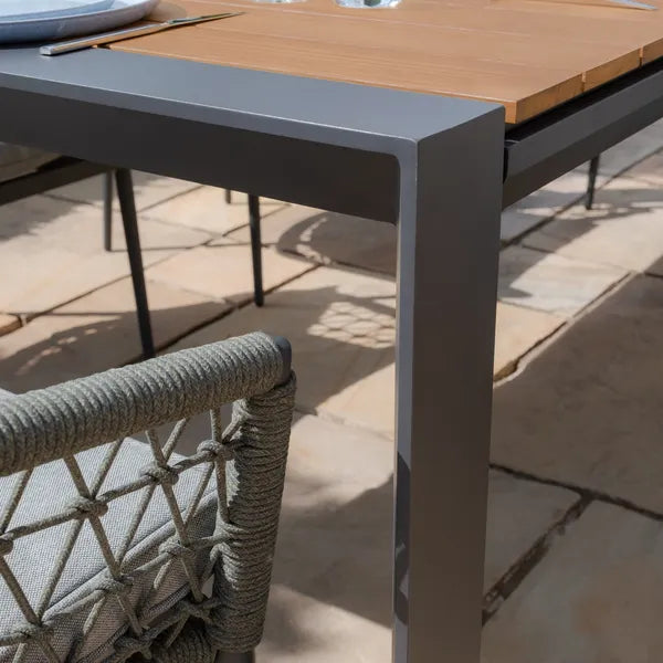 Maze - Jakarta Teak Extending 6 - 10 Seat Rectangular Dining Table
with 10 Monaco Ivy Green Rope Weave Dining Chairs - Blythe Living
