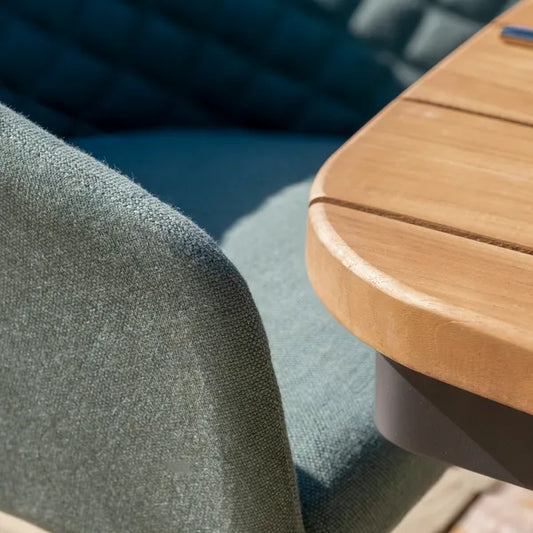 Maze - Jakarta Teak Oval Dining Table
with 6 Outdoor Fabric Ambition Sage Green Dining Chairs - Blythe Living