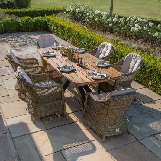 Maze - Jakarta Teak Oval Dining Table
with 6 Winchester Heritage Rattan Dining Chairs - Blythe Living