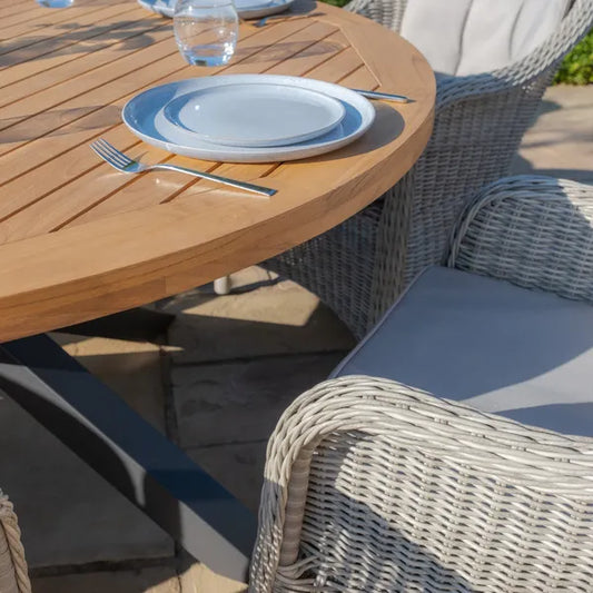 Maze - Jakarta Teak Round Dining Table
with 6 Oxford Hertiage Rattan Dining Chairs - Blythe Living