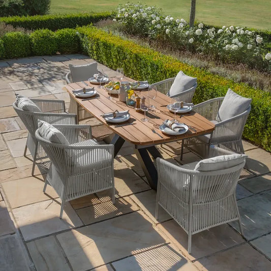 Maze - Jakarta Teak Oval Dining Table
with 6 Maldives Rope Weave Dining Chairs - Blythe Living