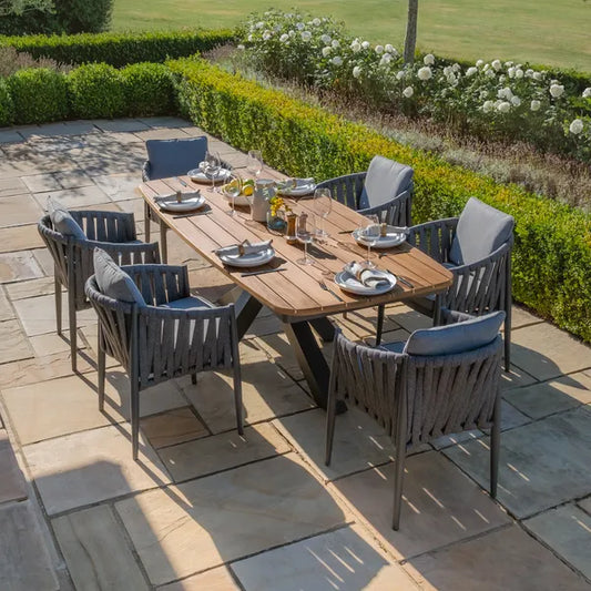 Maze - Jakarta Teak Oval Dining Table
with 6 Milan Charcoal Rope Weave Dining Chairs - Blythe Living