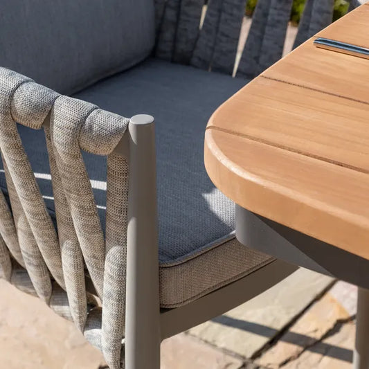 Maze - Jakarta Teak Oval Dining Table
with 6 Milan Cool Linen Rope Weave Dining Chairs - Blythe Living
