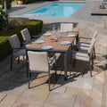 Maze - Jakarta Teak Extending 6 - 10 Seat Rectangular Dining Table
with 10 Ibiza Oatmeal Dining Chairs - Blythe Living