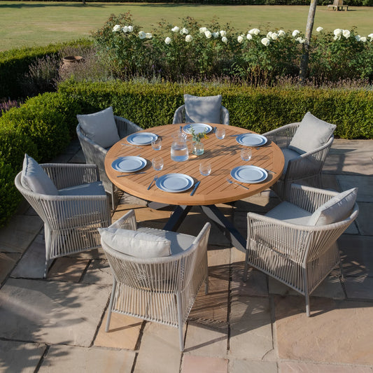 Maze - Jakarta Teak Round Dining Table
with 6 Maldives Rope Weave Dining Chairs - Blythe Living