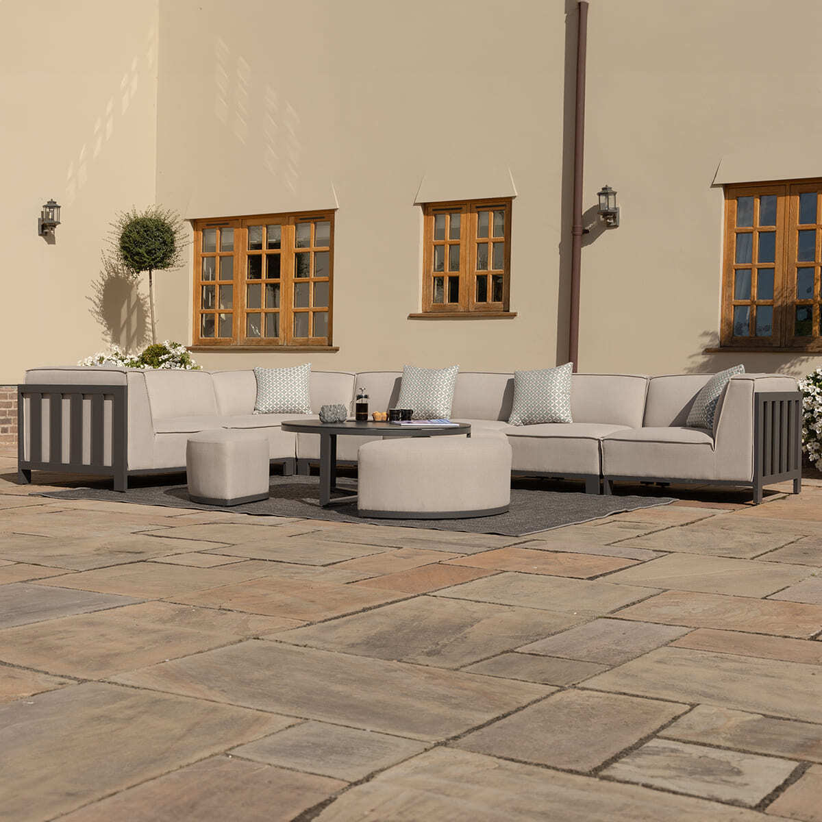 Maze - Outdoor Fabric Ibiza Large Corner Sofa Set with Round Coffee Table & 3 Footstools - Oatmeal - Blythe Living