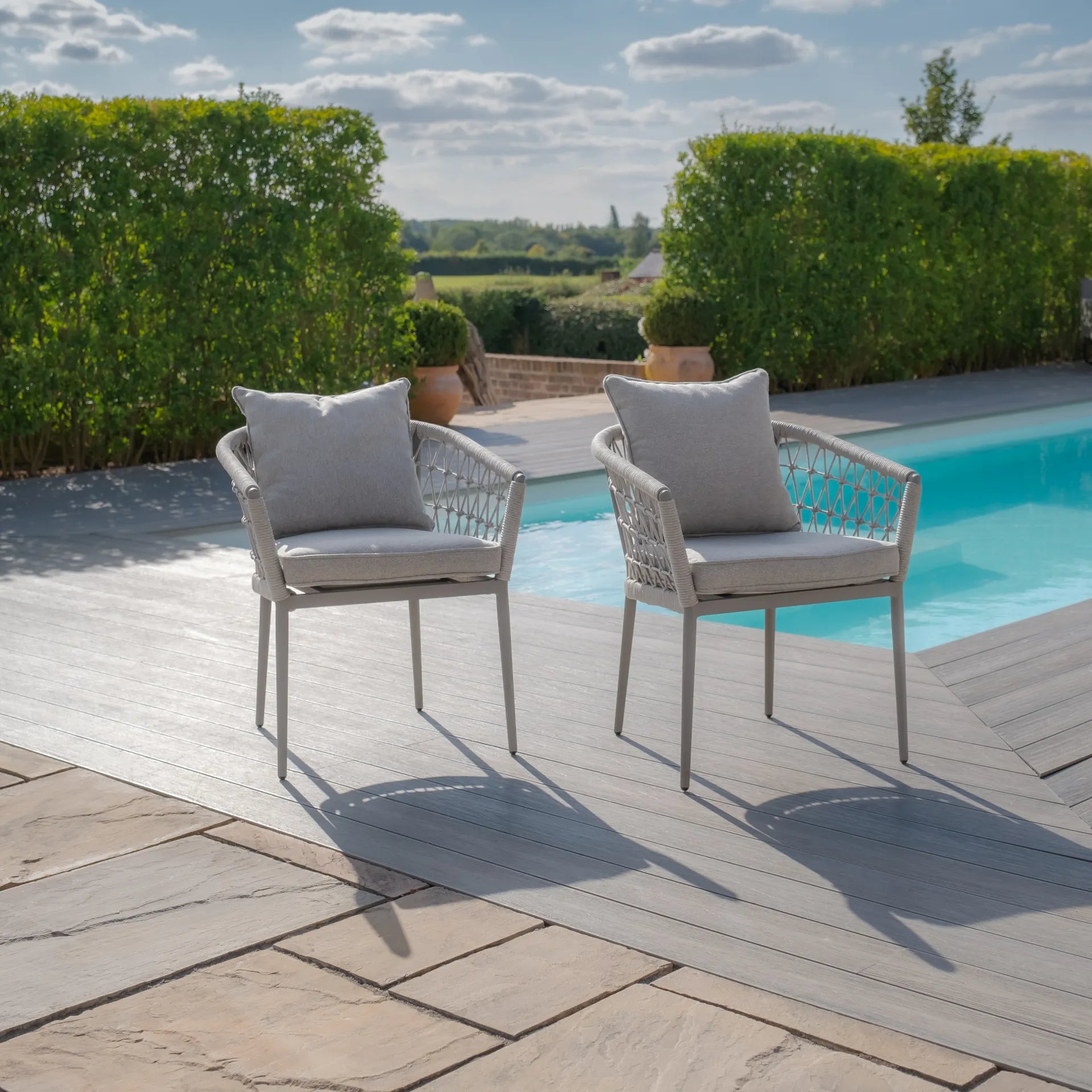 Buy Jakarta teak dining set with shower resistant cushions

