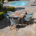 Buy Jakarta teak extending dining table with sage green chairs
