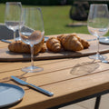 Buy Maze Jakarta teak oval dining table with 8 Ambition oatmeal chairs UK