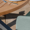 Buy Maze Jakarta teak round dining table with 6 Ambition sage green chairs UK