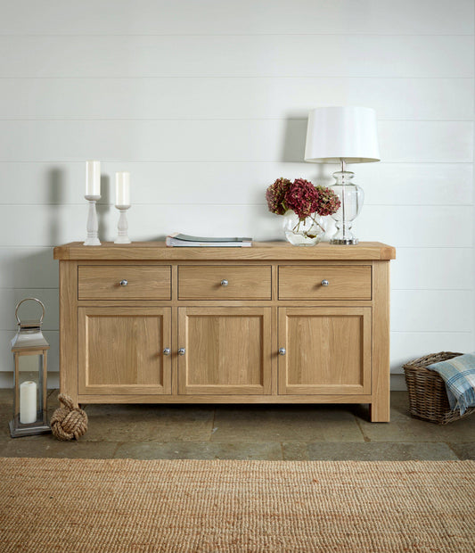 Buy Normandy 166cm Rustic Oak Large Sideboard featuring Polished Silver Handles
