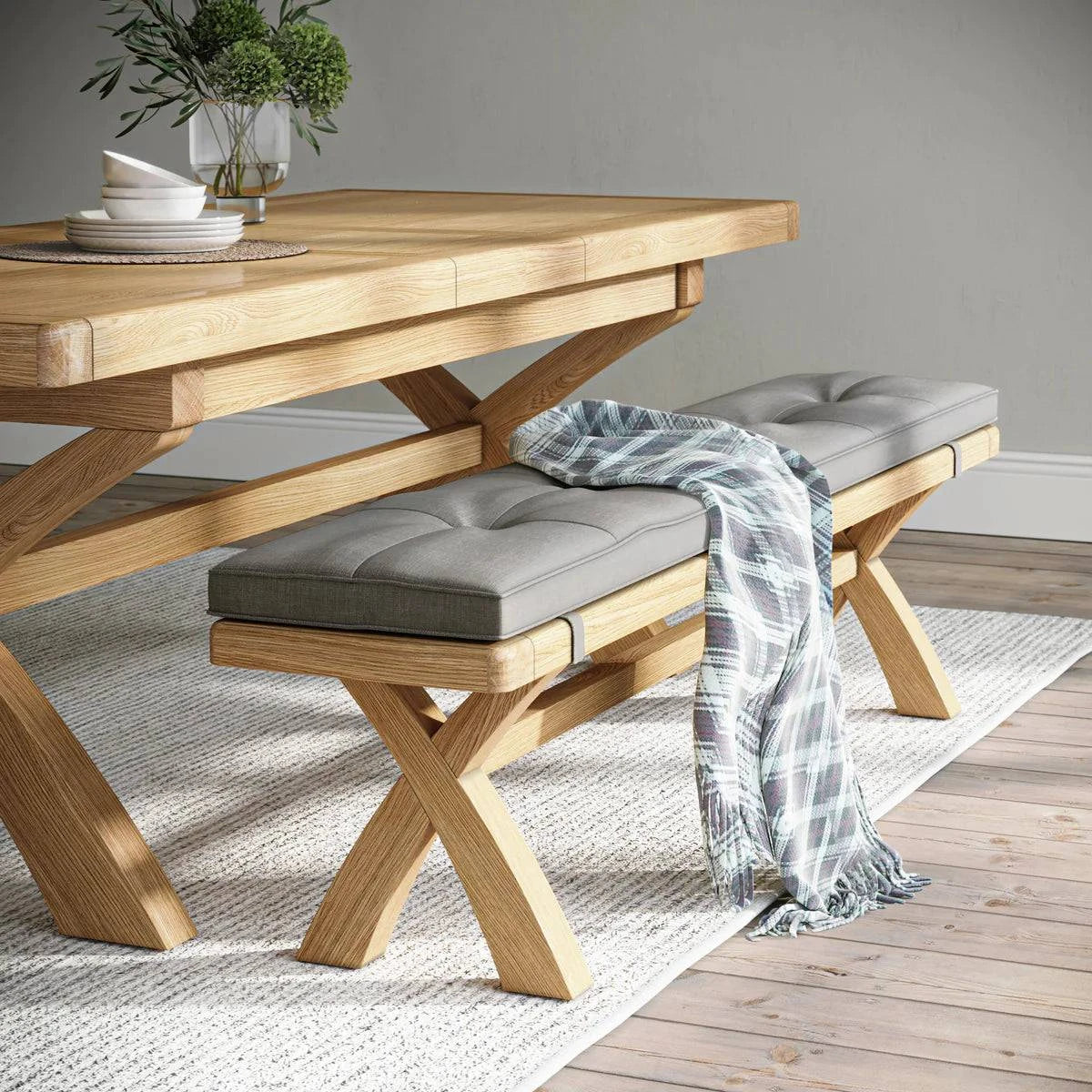 Buy chunky oak 200cm cross legged dining bench grey fabric seat free UK delivery
