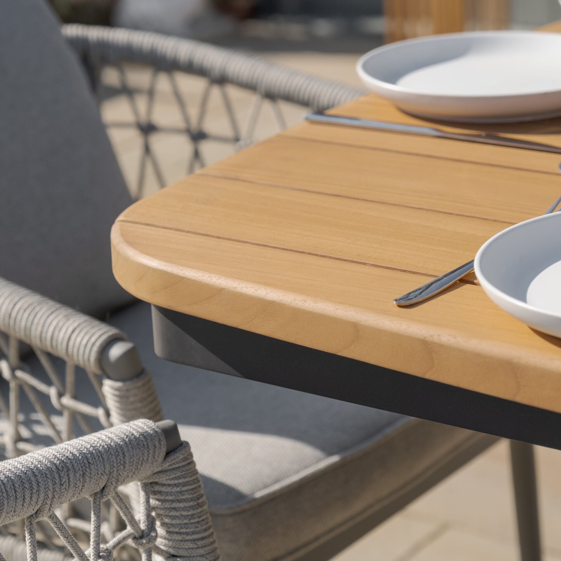 Order Jakarta oval table with premium teak tabletop
