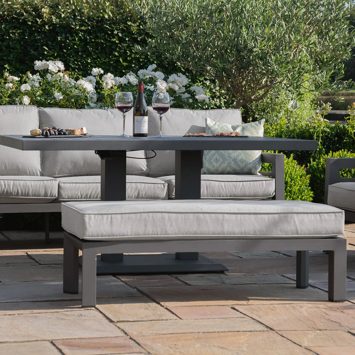 Order outdoor sofa set with height adjustable rising table