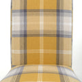 Order upholstered dining chair with scroll back online