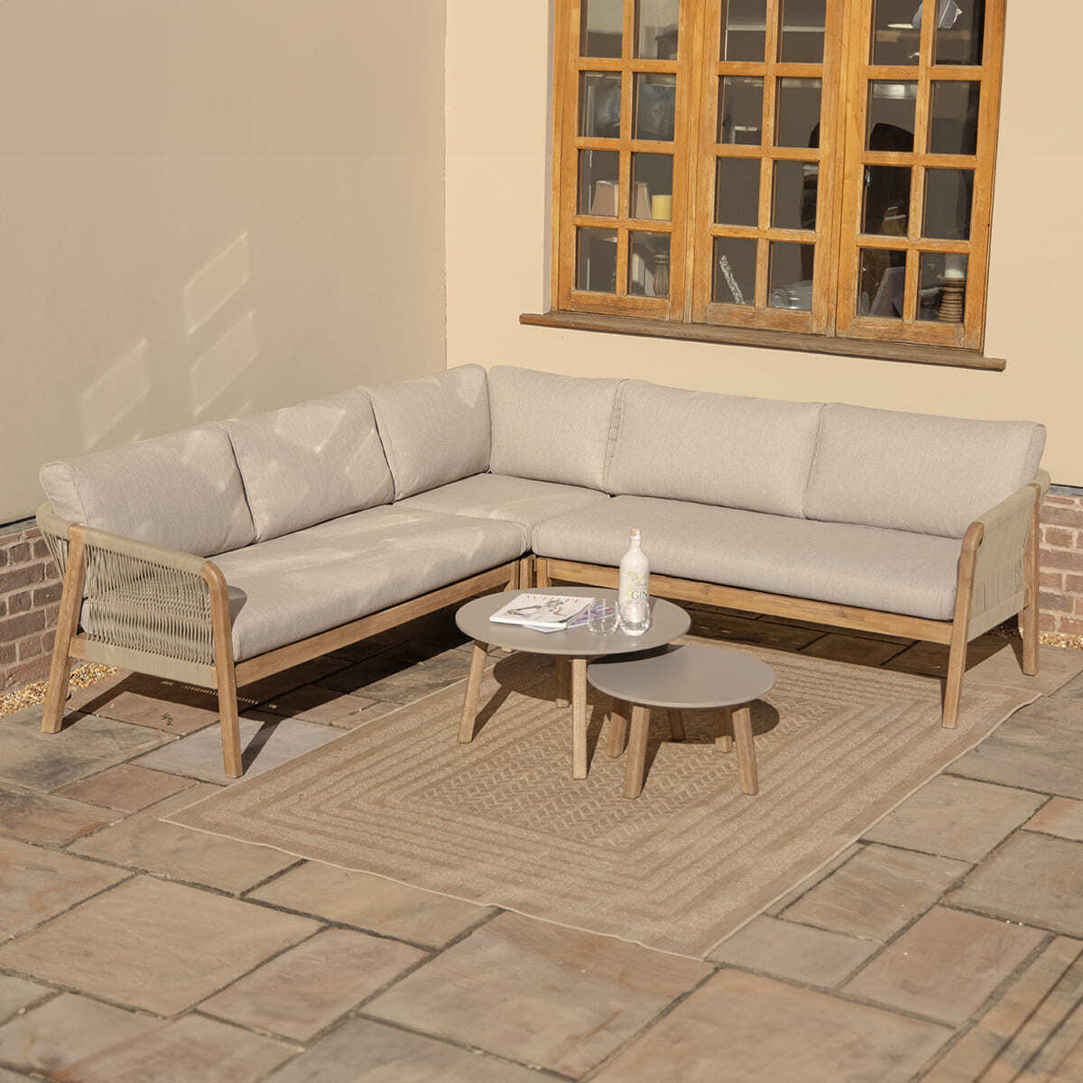 Shop Maze Martinique corner sofa with round coffee tables