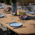 Shop modern Grade A teak oval garden table and 8 oatmeal fabric chairs online