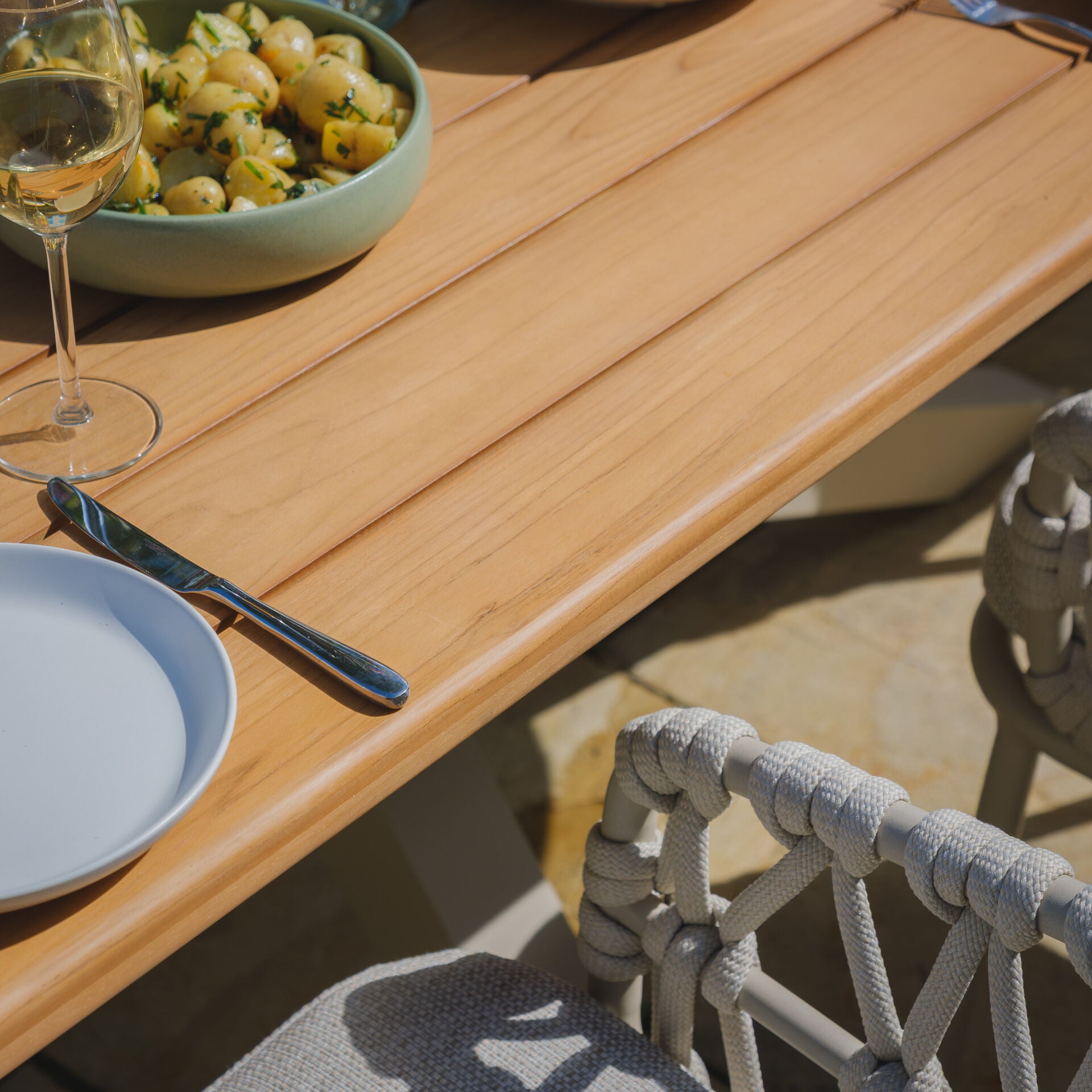 Sicily 6 Seat Rectangular Dining Set in a modern garden layout, perfect to shop for stylish outdoor dining