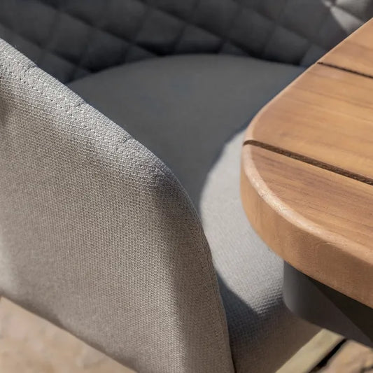 Maze - Jakarta Teak Oval Dining Table
with 6 Outdoor Fabric Ambition Oatmeal Dining Chairs - Blythe Living